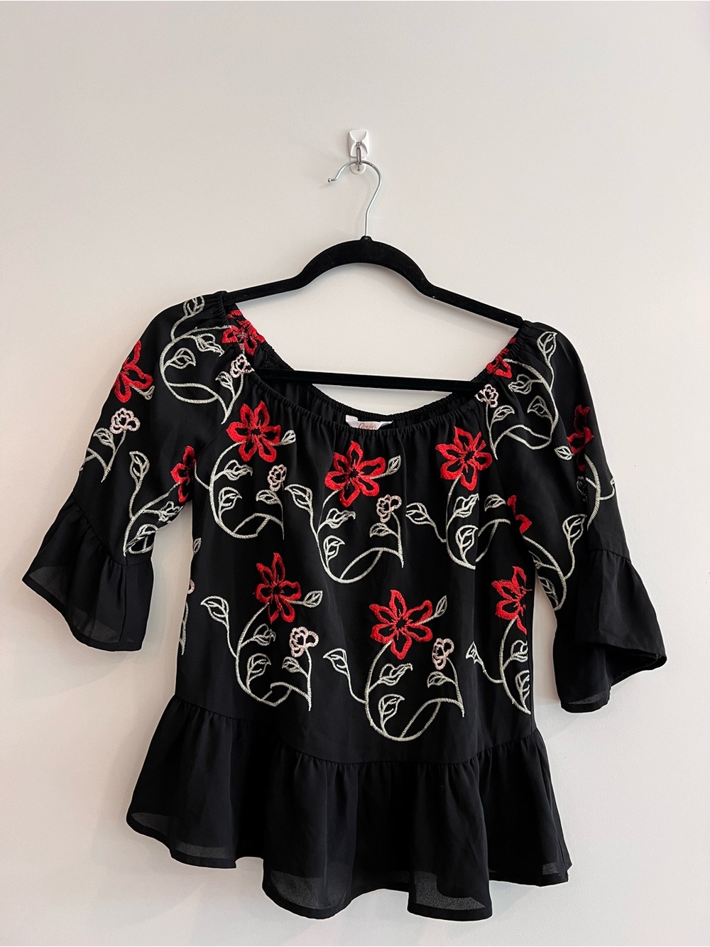 Candie's Black Off-Shoulder Peplum Blouse with Red and Cream Floral Embroidery - Picture 3 of 4